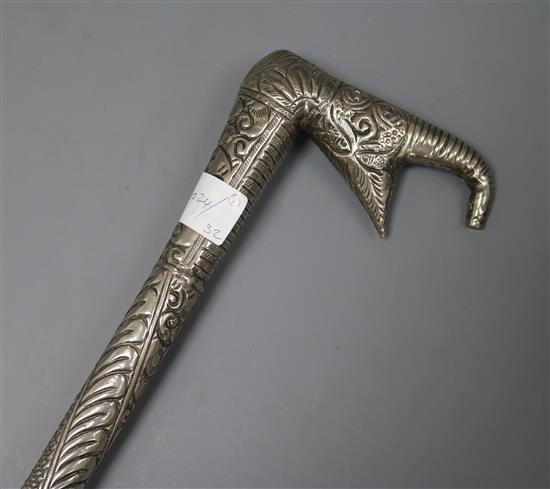 An Indian white metal walking stick length 90cm